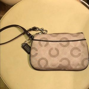 Tan Coach wristlet